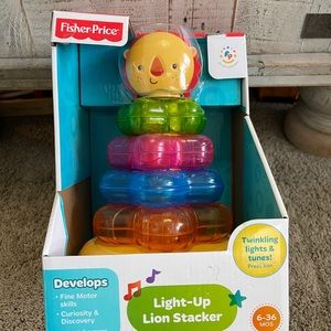 New in box fisher price light-up lion stacker
